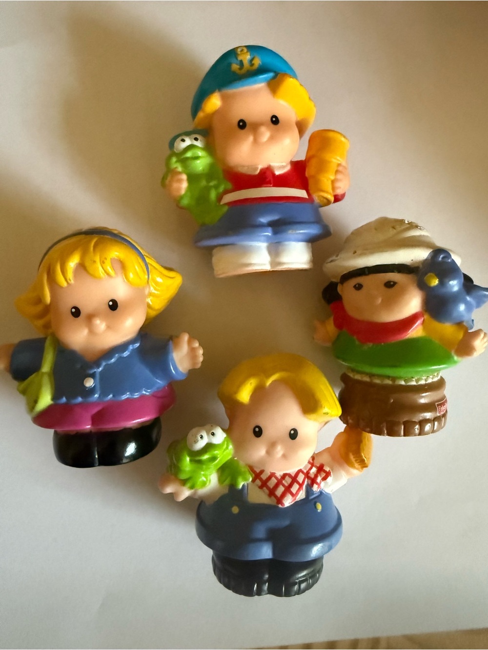 Four Mattel Little People set